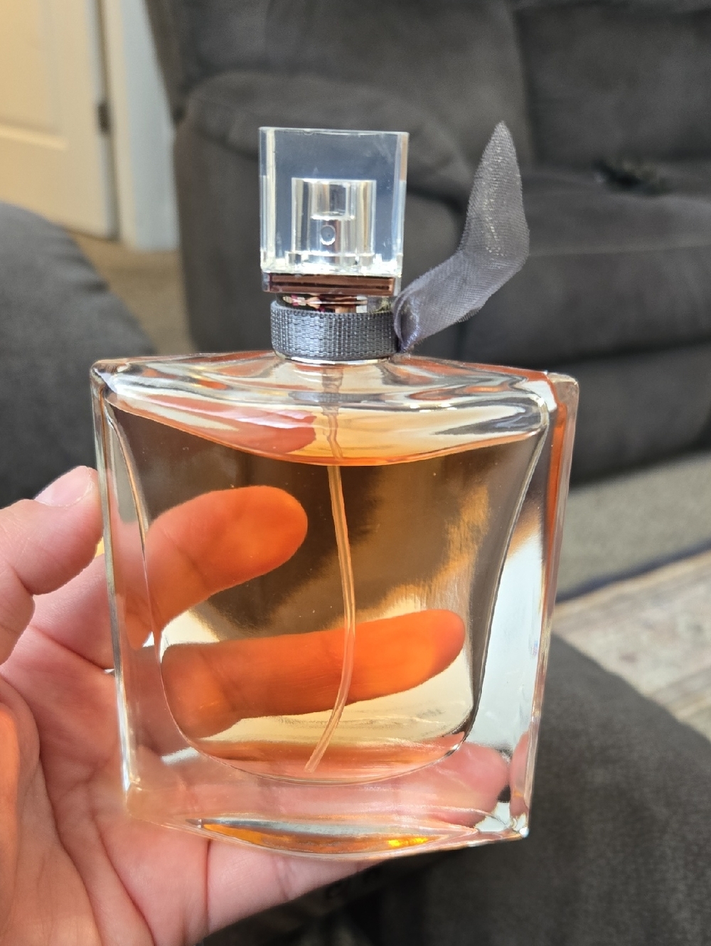 Lancome Women's Perfume Bottle with Amber Liquid and Silver Ribbon